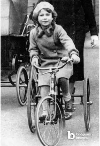 Princess Elisabeth (Elisabeth II) tricycle in Hyde Park, London, ca. 1930 - QUEEN ELIZABETH II riding a bike in the Hyde Park, LondonPhoto © Keystone/Zuma / Bridgeman Images