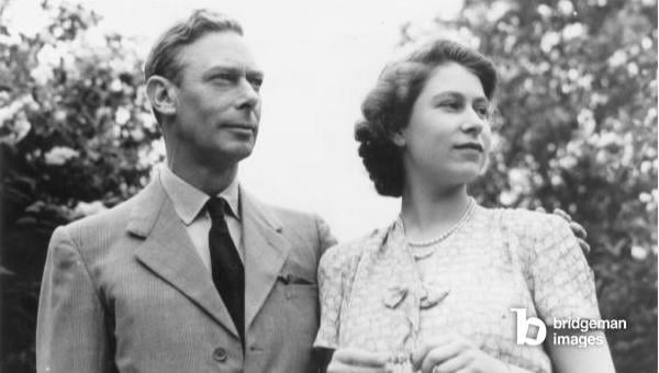 GEORGE VI (1895-1952) King of Great Britain, 1936-1952. Photographed with his daughter, the future Queen Elizabeth II, c.1946 © Granger / Bridgeman Images